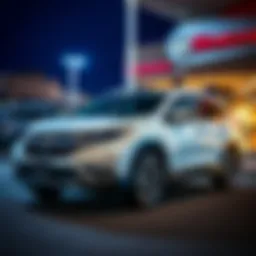 A 2016 Honda CR-V EX-L parked at a dealership, showcasing its sleek design and clean exterior.