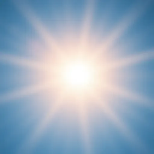 A bright sun shining with rays extending outward against a clear blue sky.