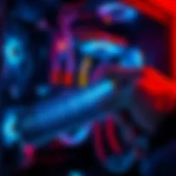 A person using compressed air to clean dust from a computer's internal components