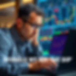 A worried investor looks at stock charts on a laptop, reflecting on buying the dip amidst market uncertainty.