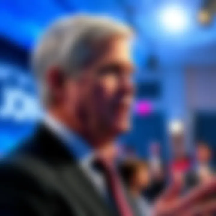 Jamie Dimon, CEO of JPMorgan, speaking at a conference, expressing concerns about bitcoin investments, with a focused expression and audience in the background.