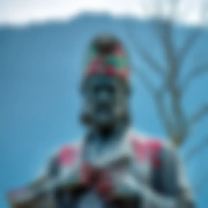 Damaged Satoshi statue in Lugano with graffiti on it