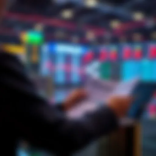 A person reviewing financial documents with a laptop and calculator, contemplating selling assets in a market environment