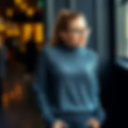 A woman wearing a fitted, stylish jumper that complements her figure, showcasing a sleek design without a boxy shape.